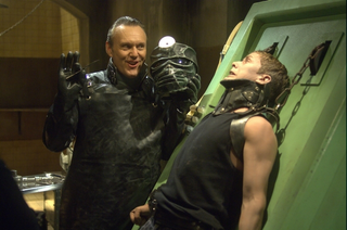 Illustration for article titled Giles Gets Stab-Happy With A Scapel In New Repo Stills